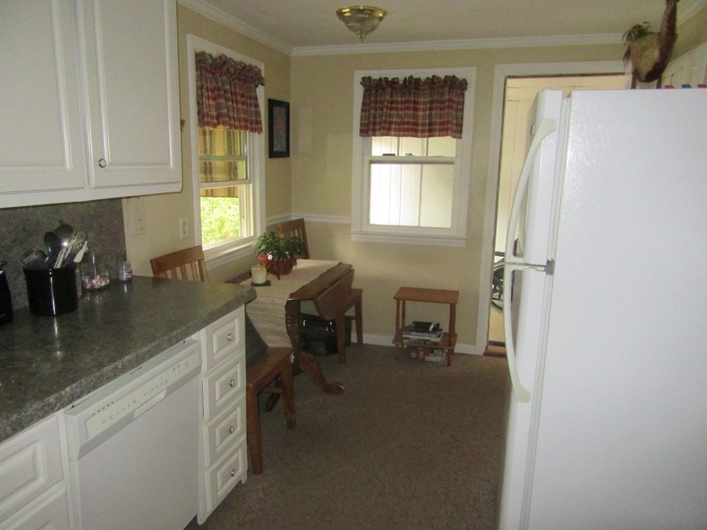 92 Maebeth Street Springfield, MA 01119 - Photo 19 of 21 a kitchen with sink refrigerator and window