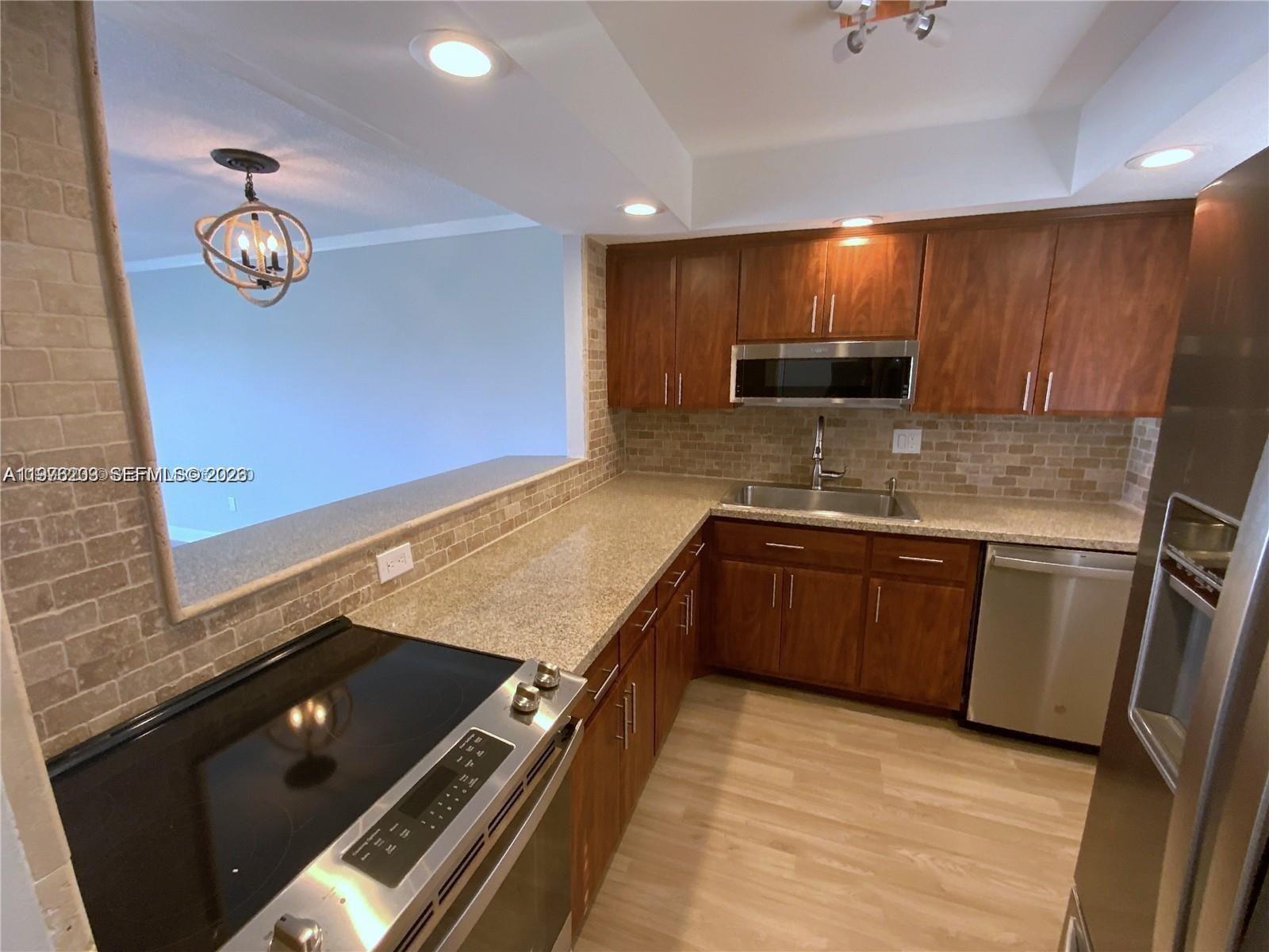 7785 Southwest 86th Street, Unit E413 Miami, FL 33143 - Photo 3 of 20