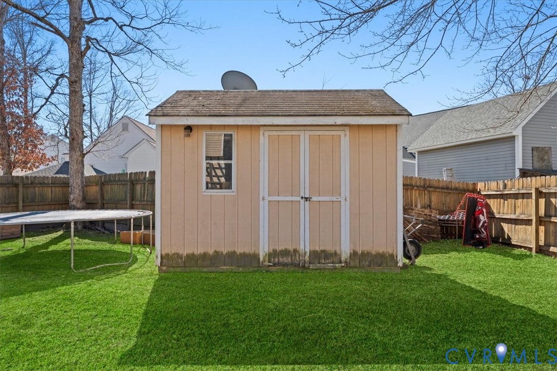 14126 Bermuda Point Court Chester, VA 23836 - Photo 15 of 50 a front view of a house with garden