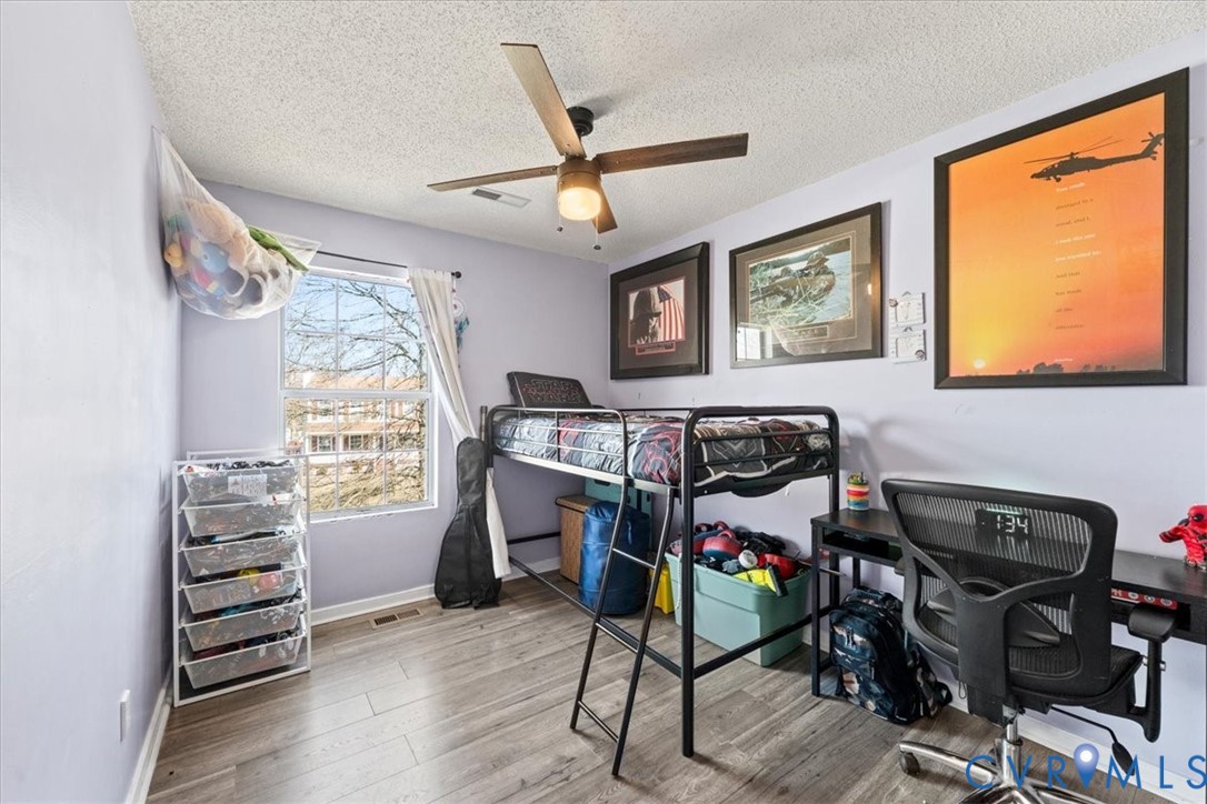 14126 Bermuda Point Court Chester, VA 23836 - Photo 47 of 50 a view of a livingroom with furniture and windows