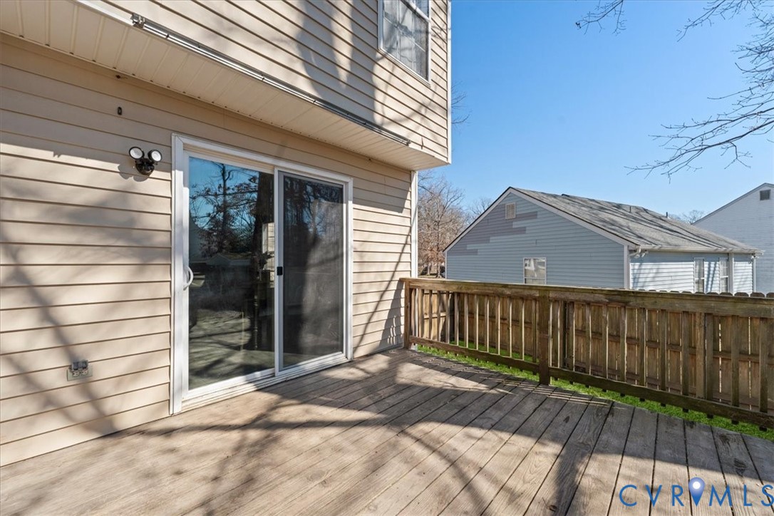 14126 Bermuda Point Court Chester, VA 23836 - Photo 8 of 50 a view of backyard with a deck and wooden floor