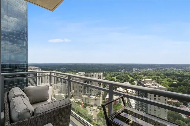 a view of roof with city view