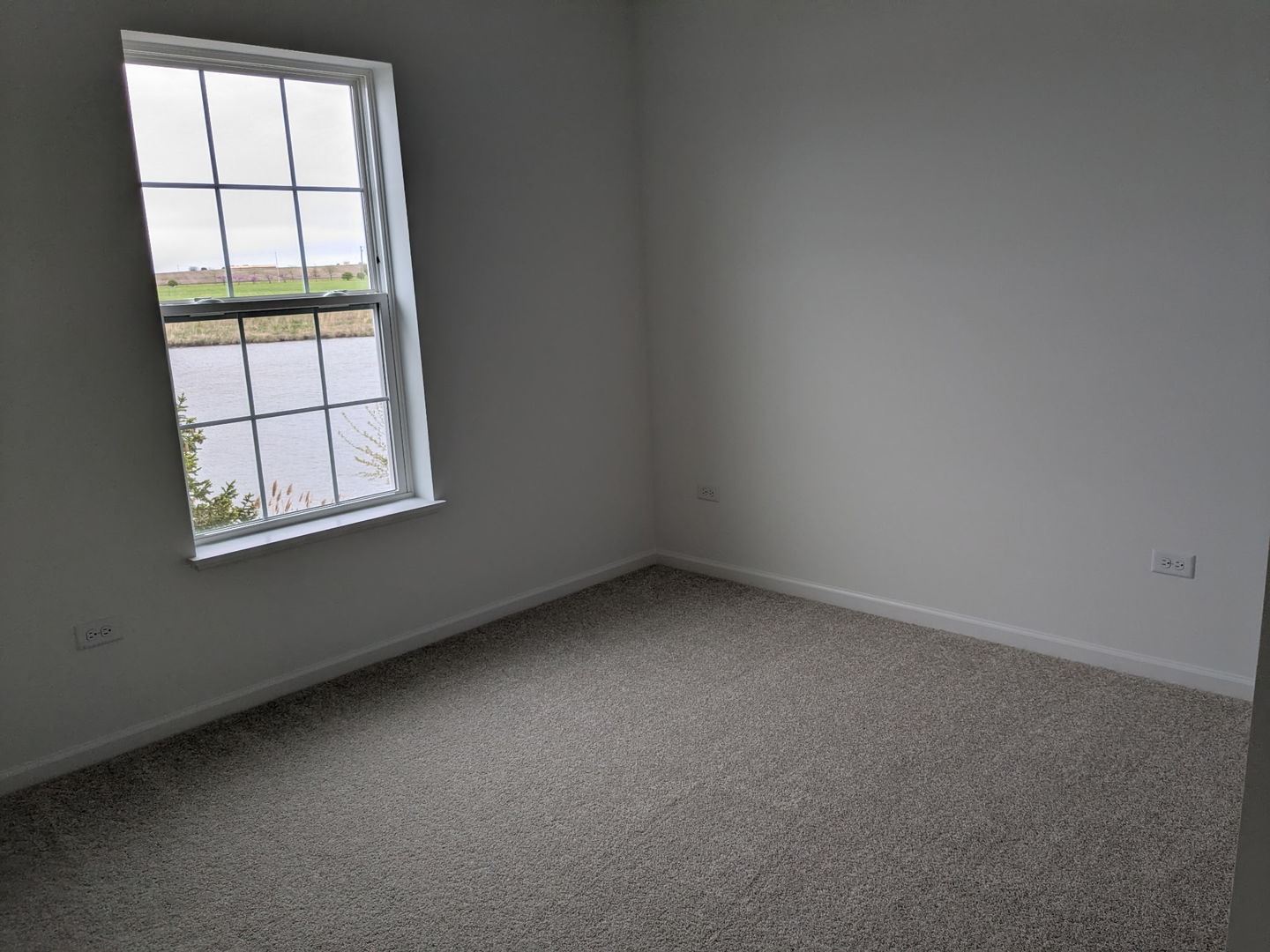 7828 Nightshade Lane Joliet, IL 60431 - Photo 11 of 23 an empty room with a window