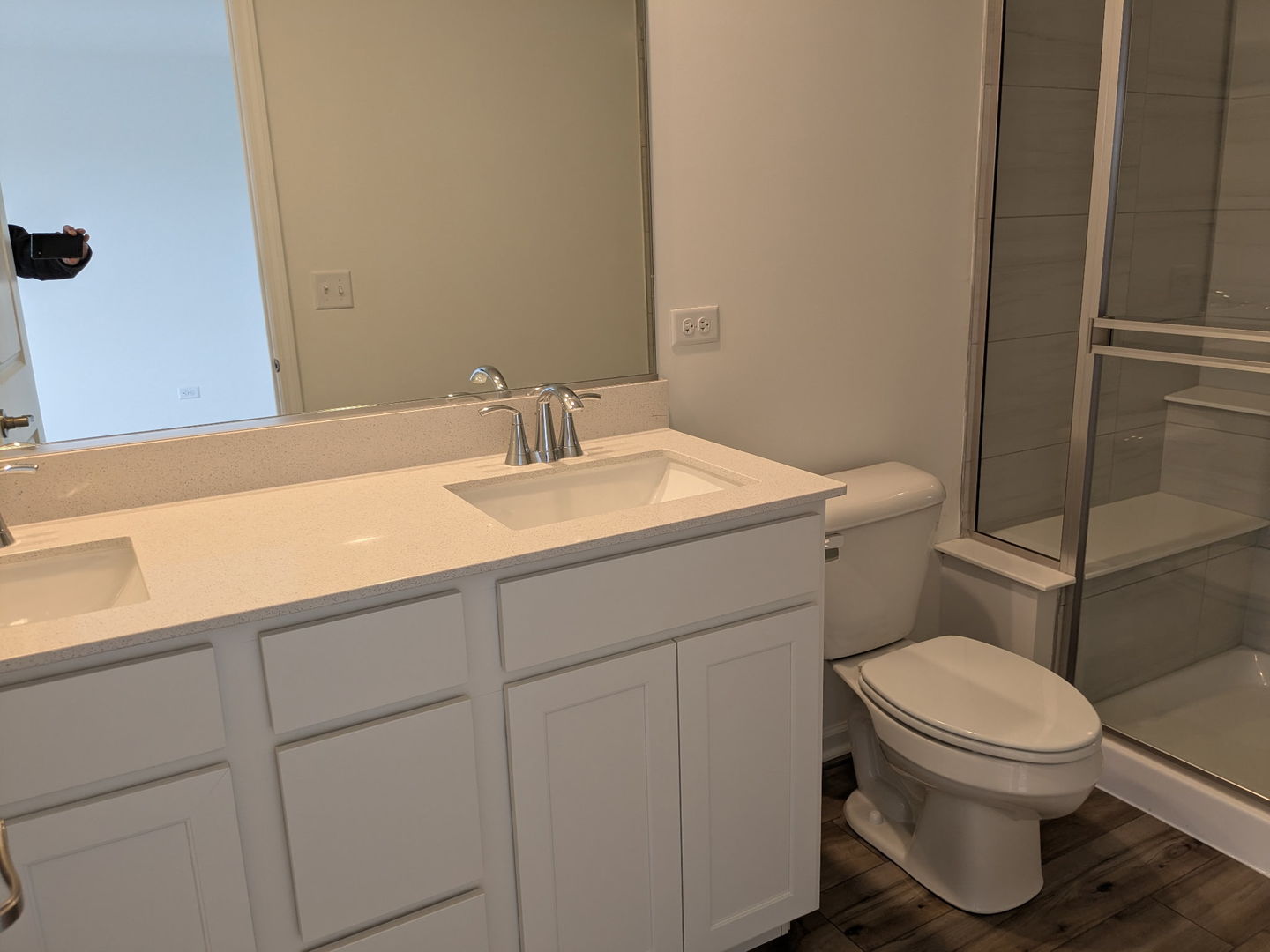 7828 Nightshade Lane Joliet, IL 60431 - Photo 15 of 23 a bathroom with a toilet sink and mirror