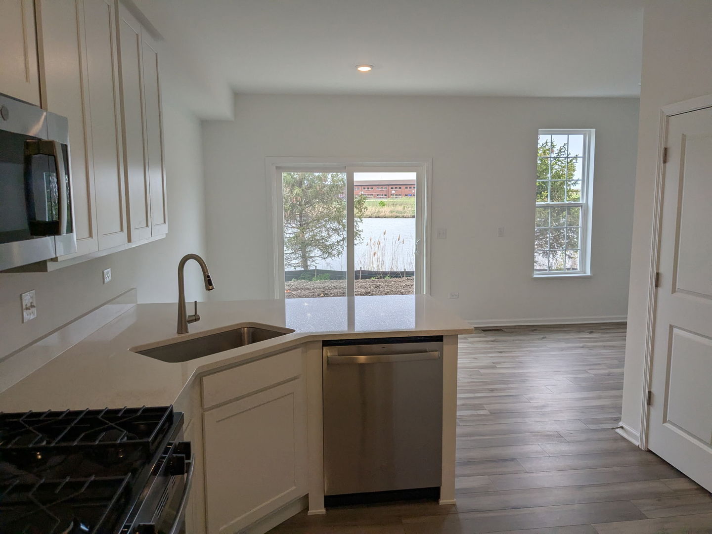 7828 Nightshade Lane Joliet, IL 60431 - Photo 6 of 23 a kitchen with sink and cabinets