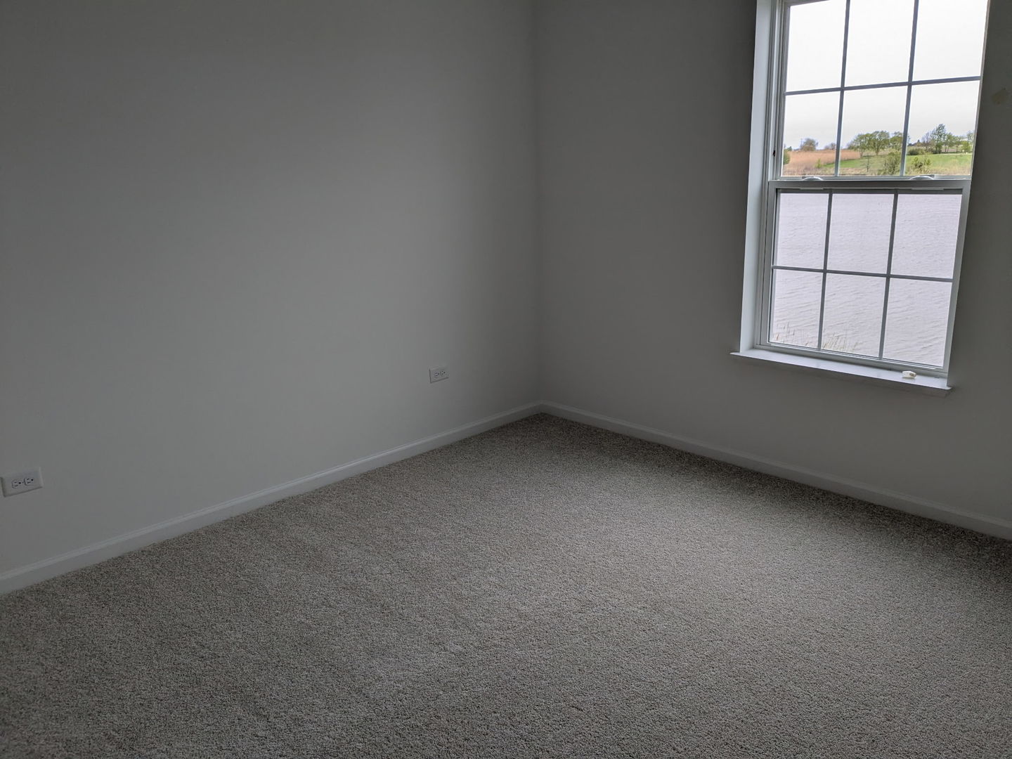 7828 Nightshade Lane Joliet, IL 60431 - Photo 7 of 23 an empty room with a window