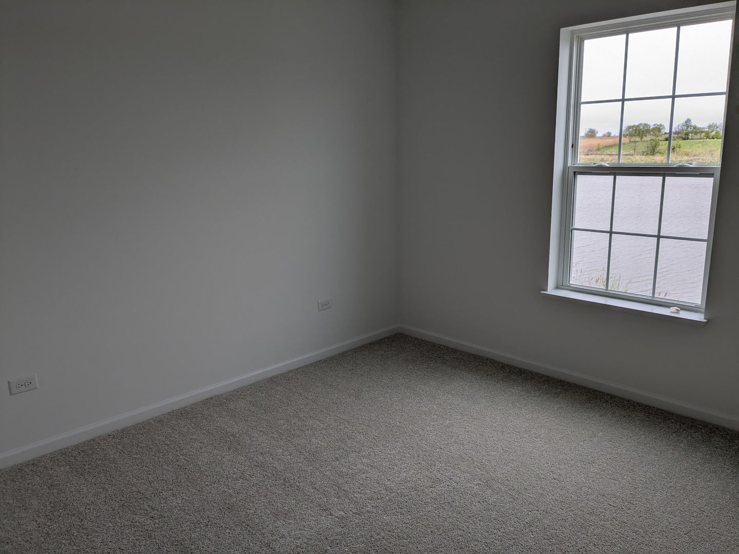 7828 Nightshade Lane Joliet, IL 60431 - Photo 8 of 23 an empty room with a window