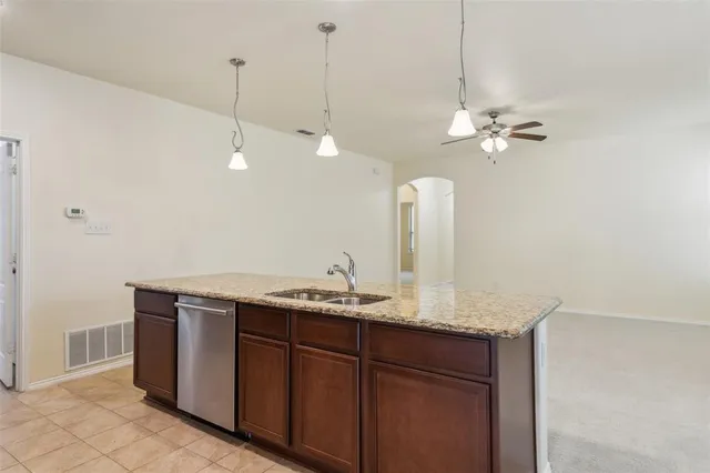 a bathroom with a sink vanity and a mirror