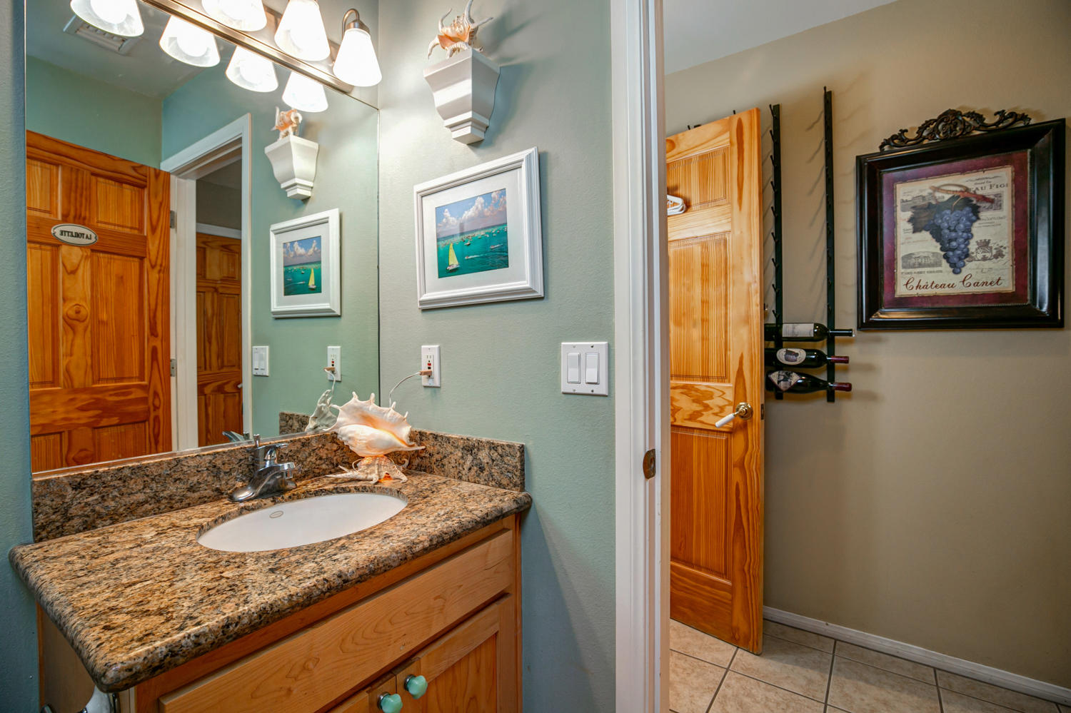 179 Baldwin Road Ojai, CA 93023 - Photo 15 of 39 a bathroom with a granite countertop sink a mirror and a shower