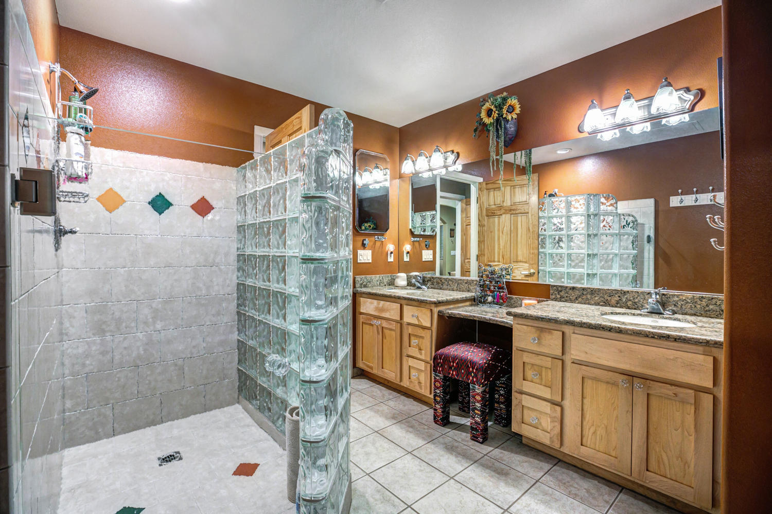 179 Baldwin Road Ojai, CA 93023 - Photo 18 of 39 a bathroom with a sink a large mirror and a shower