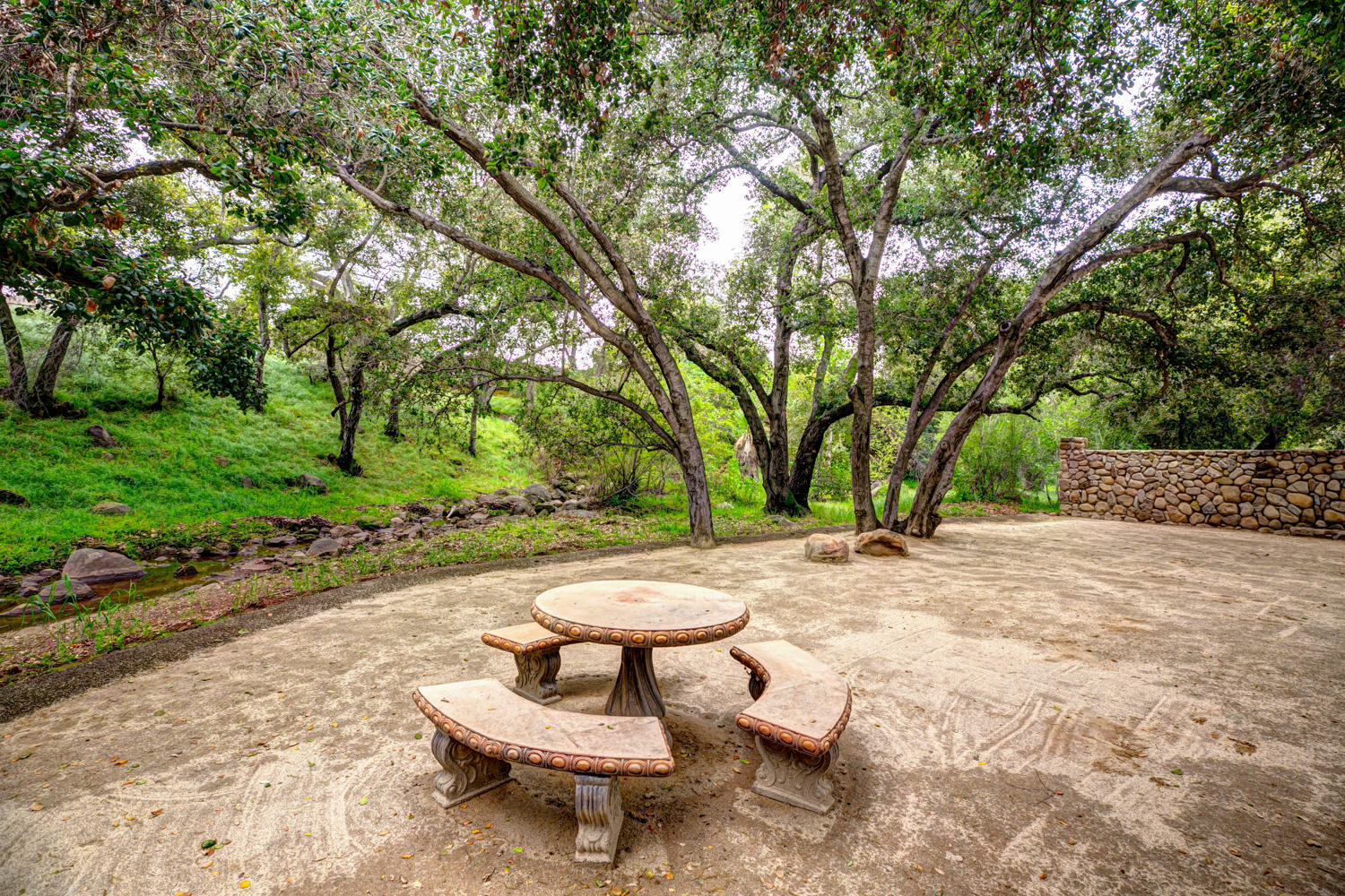 179 Baldwin Road Ojai, CA 93023 - Photo 34 of 39 a view of a backyard with table and chairs plants and trees