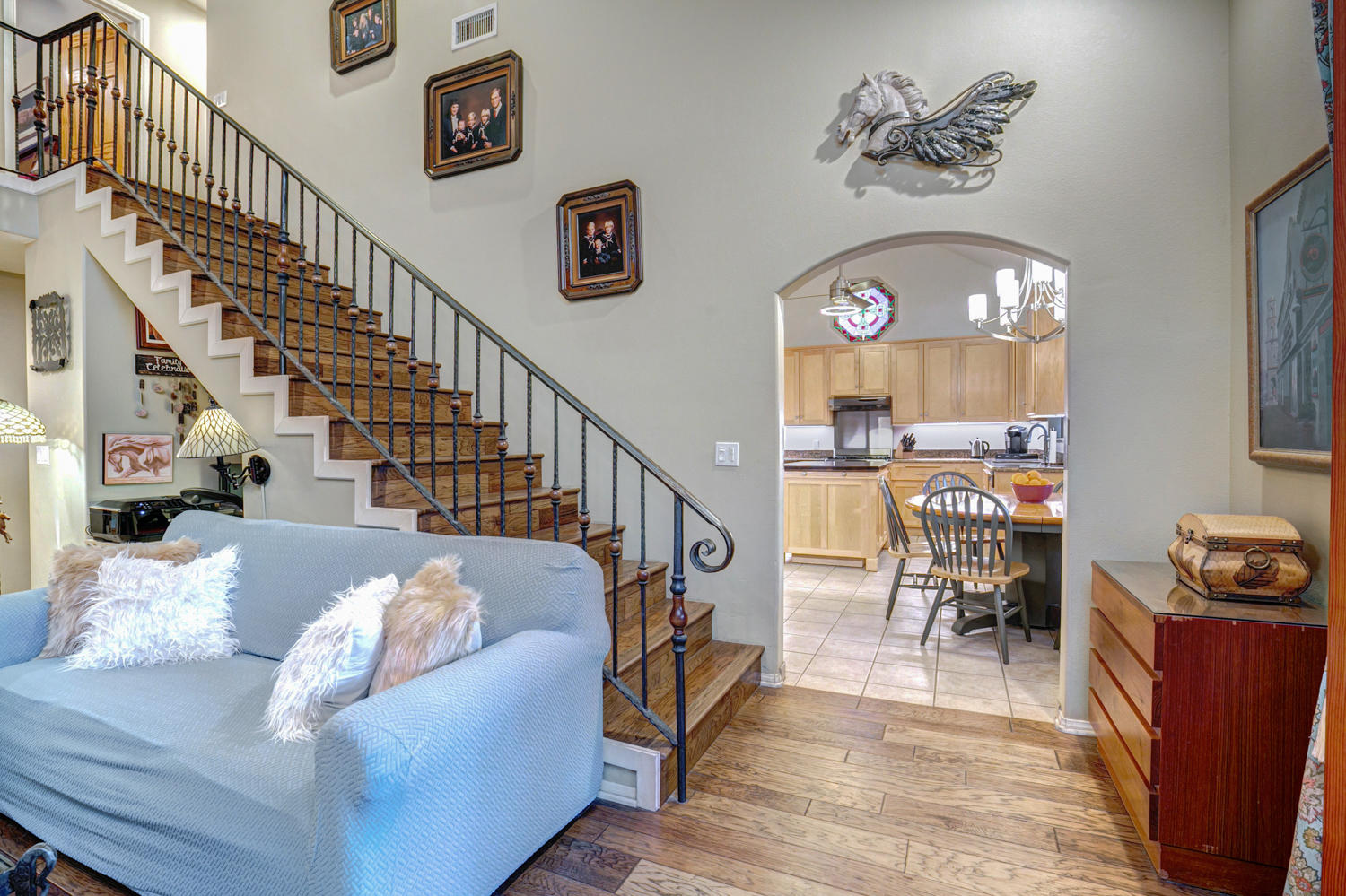 179 Baldwin Road Ojai, CA 93023 - Photo 9 of 39 a view of a livingroom with furniture a dinning room and stairs