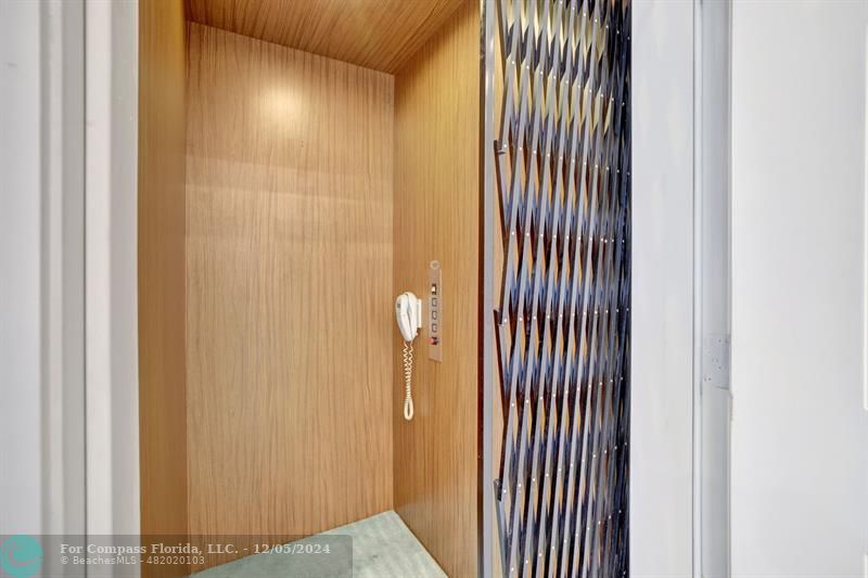 2870 Marina Circle Lighthouse Point, FL 33064 - Photo 22 of 37 a view of a room with a wooden door