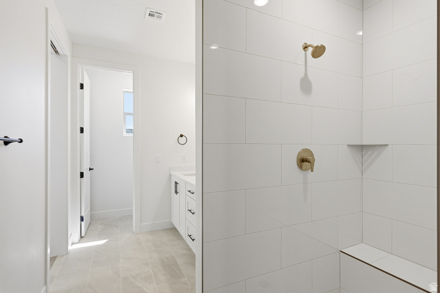 4978 North 75 East Enoch, UT 84721 - Photo 22 of 60 Bathroom featuring vanity and a tile shower