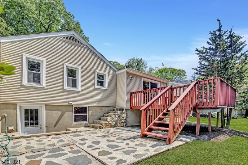 76 Hillside Road Sparta, NJ 07871 - Photo 18 of 18 a front view of a house with wooden deck