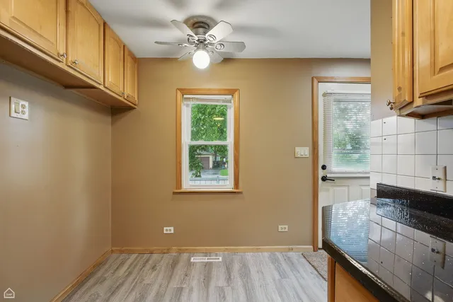 a view of a back yard of the house