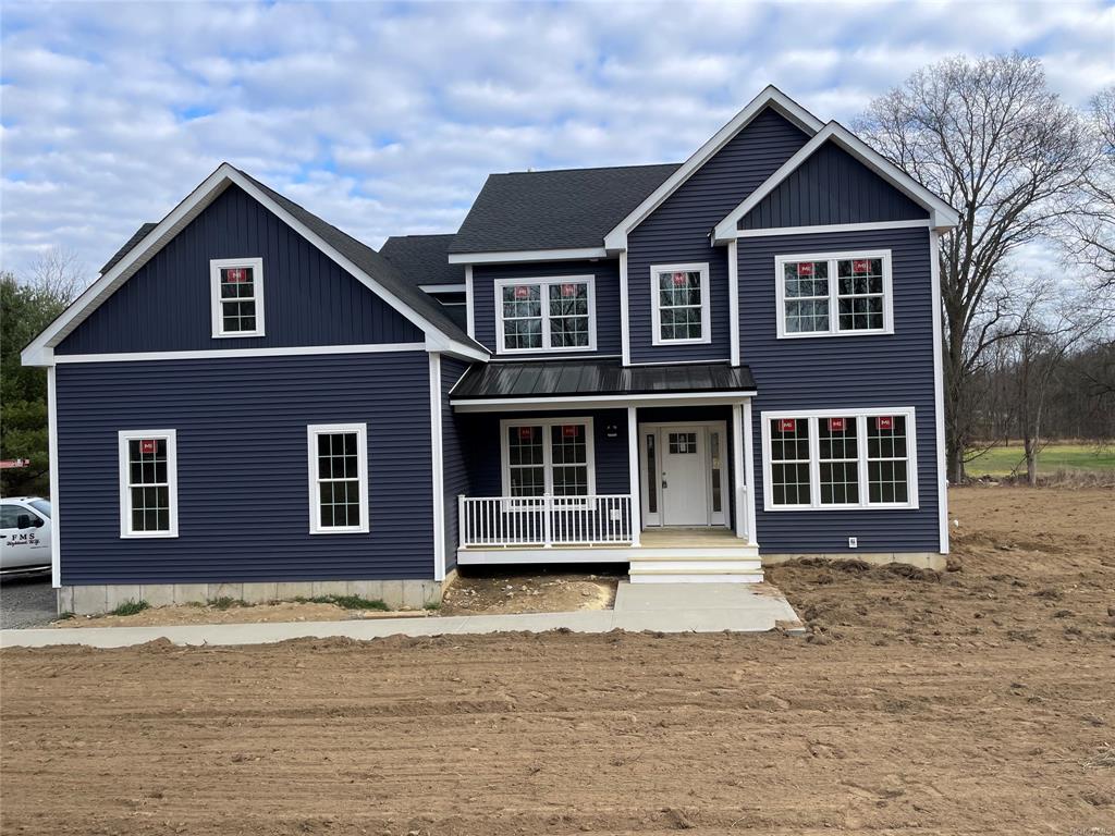 View of front of home with covered porch
