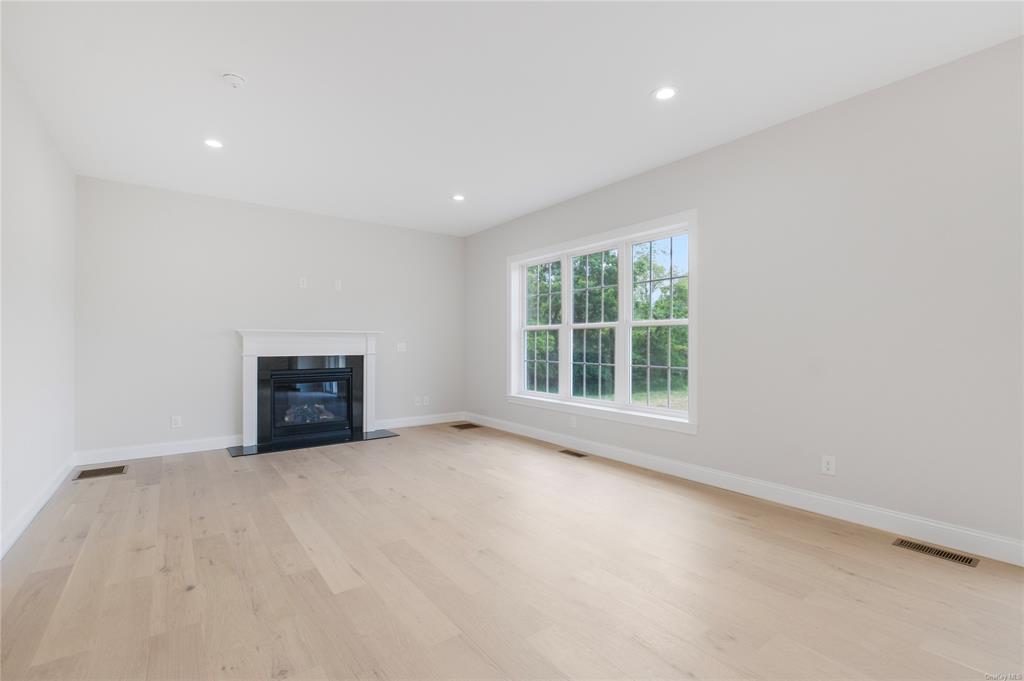 108 Browns Road Walden, NY 12586 - Photo 11 of 36 Family Room with Gas Fireplace open to Kitchen