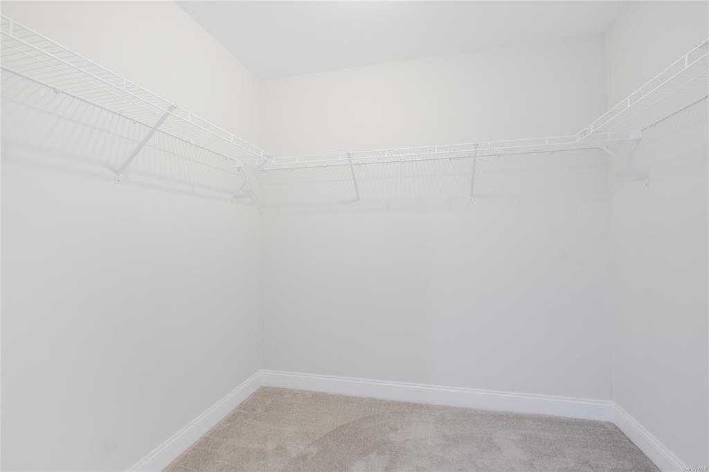 108 Browns Road Walden, NY 12586 - Photo 27 of 36 Walk in closet in Primary Bedroom featuring carpet floors