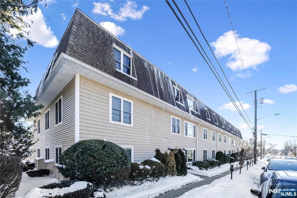 253 Park Avenue, Unit 304 Rutherford, NJ 07070 - Photo 3 of 23 a view of a house with a patio