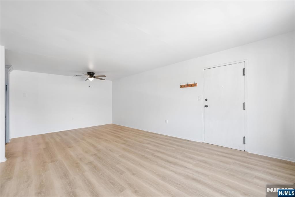 253 Park Avenue, Unit 304 Rutherford, NJ 07070 - Photo 8 of 23 a view of empty room