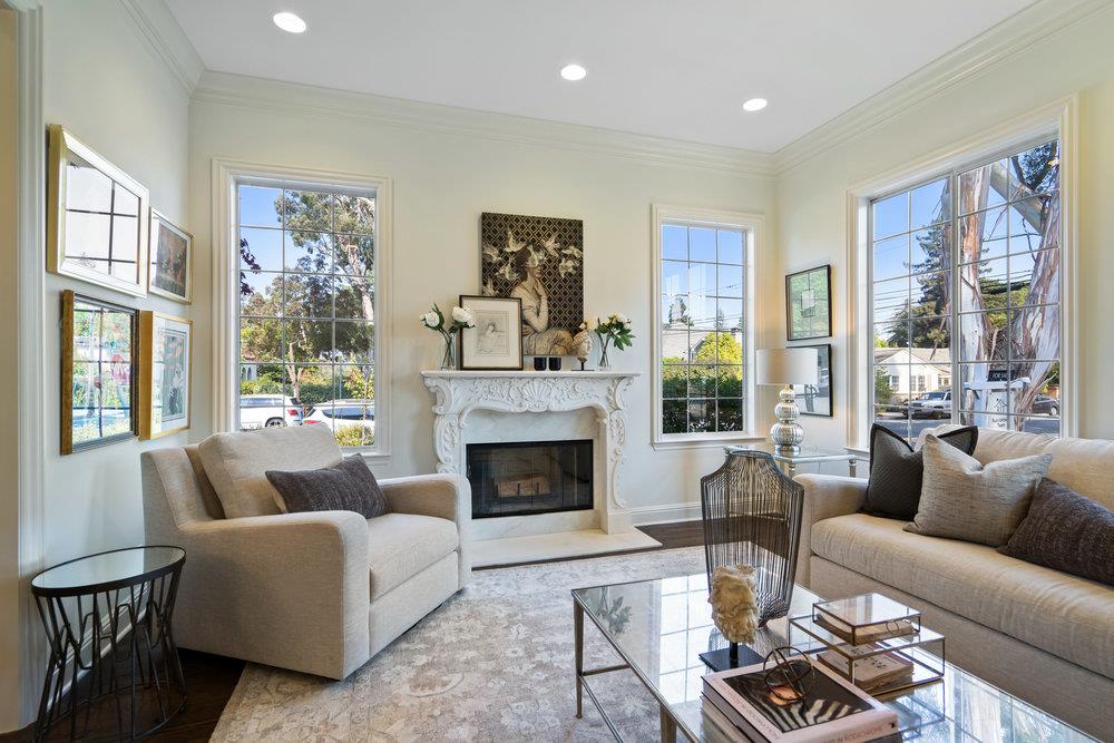 1700 Easton Drive Burlingame, CA 94010 - Photo 12 of 69 a living room with furniture fireplace and large windows