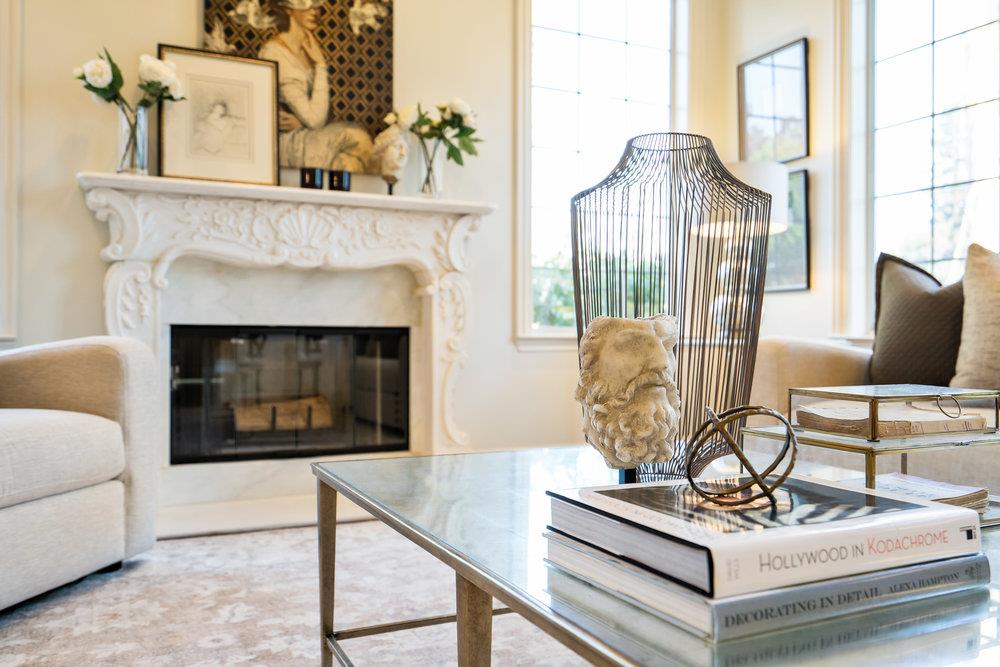 1700 Easton Drive Burlingame, CA 94010 - Photo 16 of 69 a living room with furniture a table and a fireplace