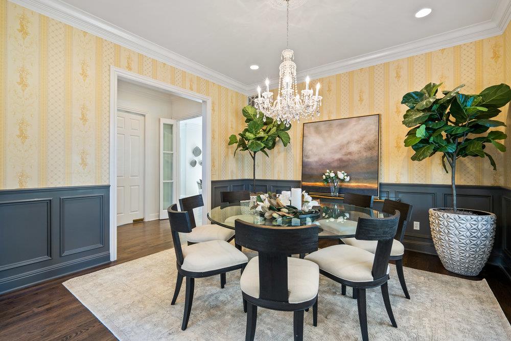 1700 Easton Drive Burlingame, CA 94010 - Photo 21 of 69 a view of a dining room with furniture and chandelier
