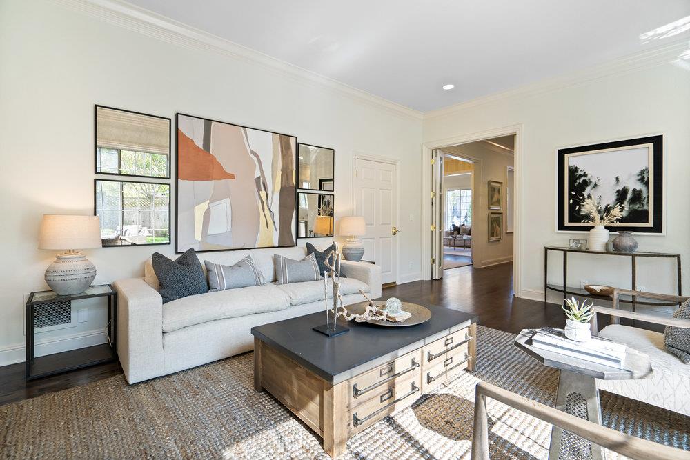 1700 Easton Drive Burlingame, CA 94010 - Photo 24 of 69 a living room with furniture a table and a large window