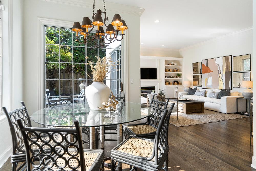 1700 Easton Drive Burlingame, CA 94010 - Photo 31 of 69 a dining room with furniture a chandelier and wooden floor
