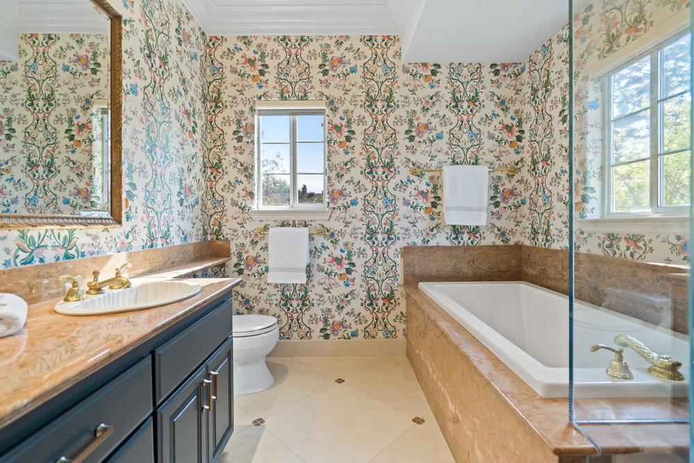 1700 Easton Drive Burlingame, CA 94010 - Photo 57 of 69 a bathroom with a sink and a bathtub