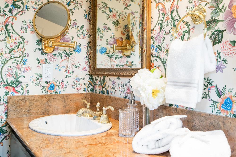 1700 Easton Drive Burlingame, CA 94010 - Photo 60 of 69 a bathroom with a sink mirror and vanity