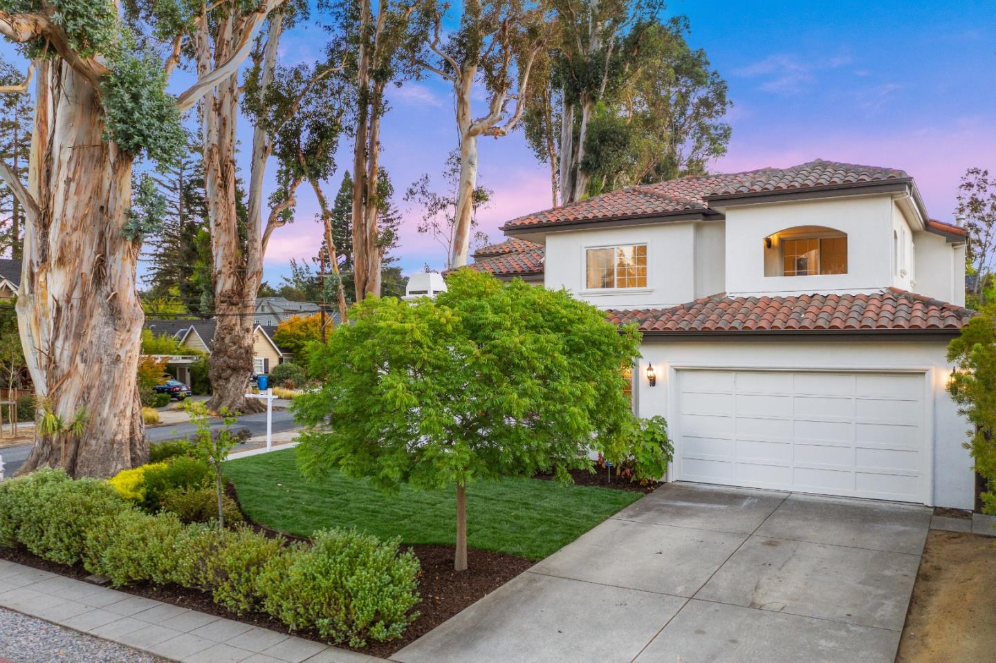 1700 Easton Drive Burlingame, CA 94010 - Photo 6 of 69 a view of a house with a yard and garage
