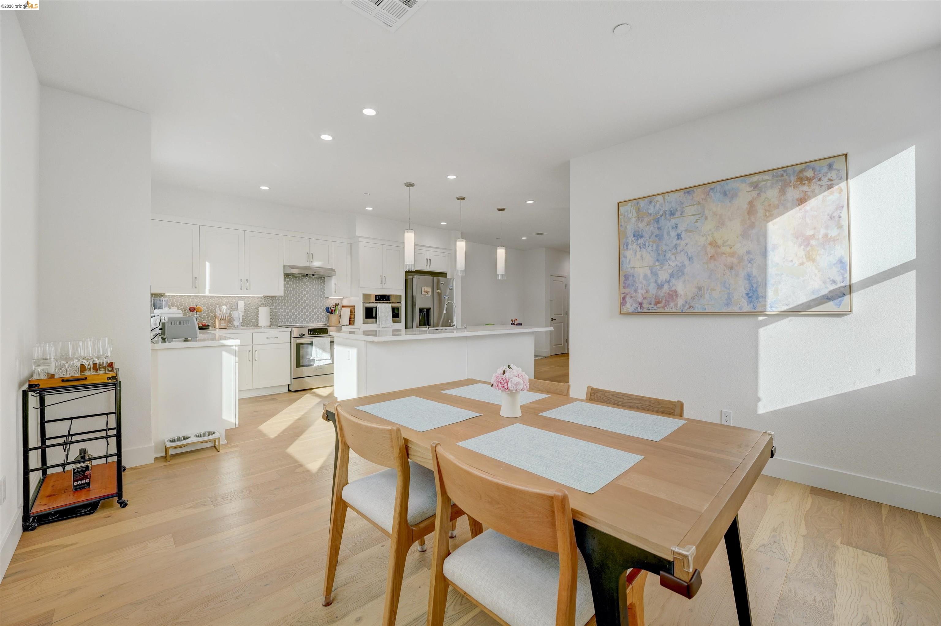 7101 Melon Court San Ramon, CA 94583 - Photo 27 of 58 a view of a dining room with furniture and wooden floor