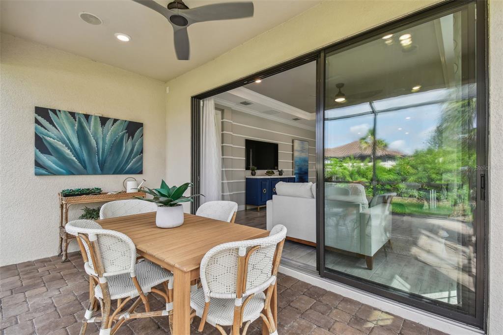 4257 Rosatti Road Wesley Chapel, FL 33543 - Photo 50 of 96 a dining room with furniture and window