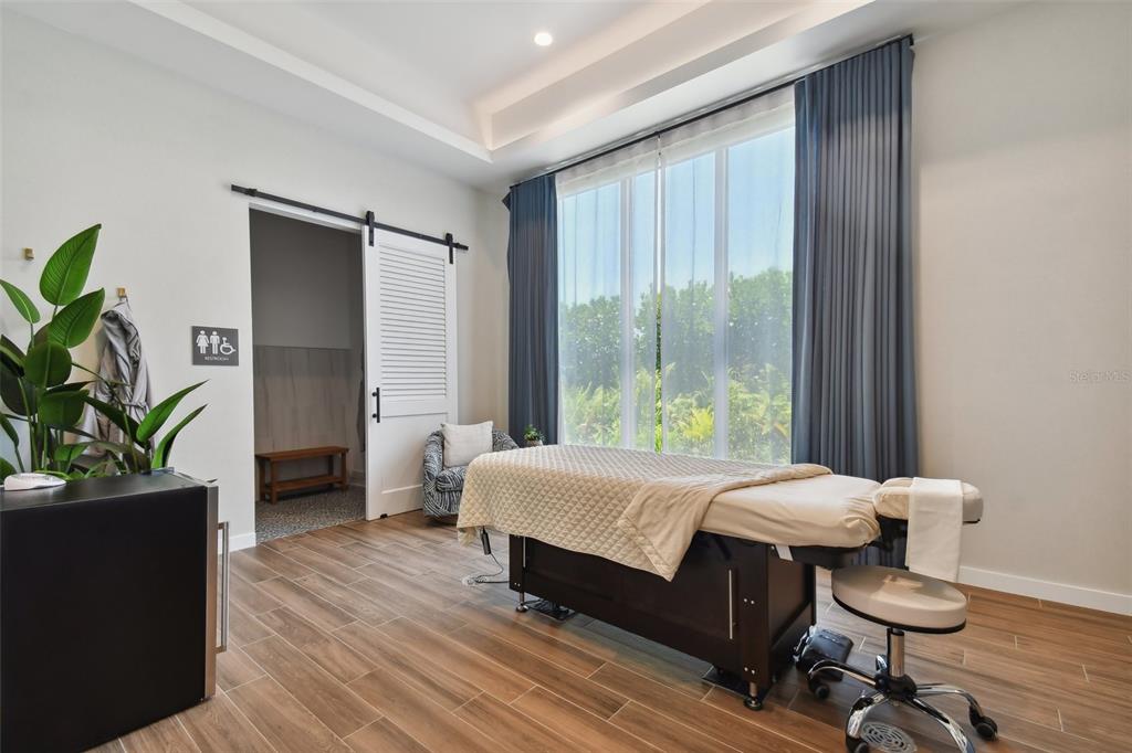 4257 Rosatti Road Wesley Chapel, FL 33543 - Photo 81 of 96 a bedroom with a bed and a window