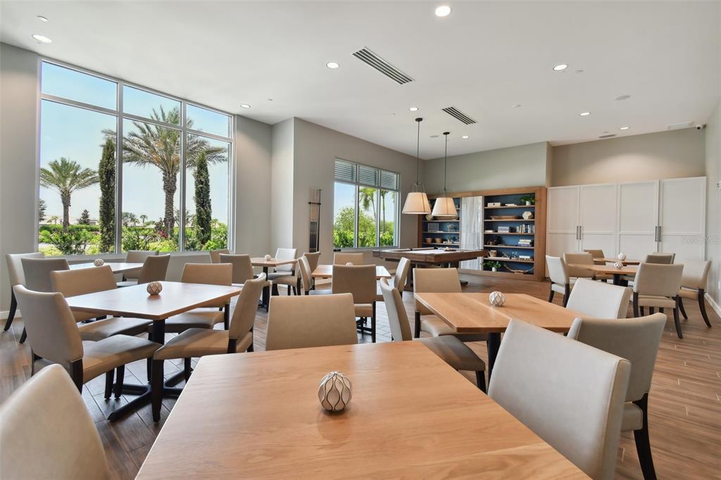 4257 Rosatti Road Wesley Chapel, FL 33543 - Photo 95 of 96 a view of a dining room with furniture window and outside view