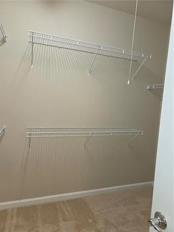a view of a room with racks on the wall