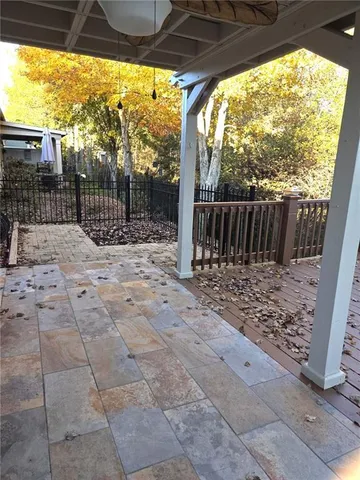 a view of backyard with green space