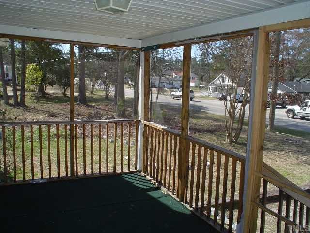 213 New Rand Road Garner, NC 27529 - Photo 3 of 3 a view of a glass door with a balcony