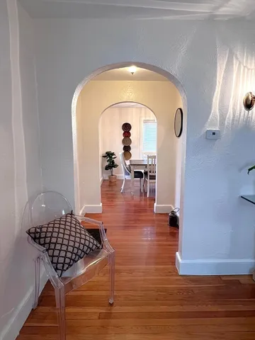 a bathroom with a sink a mirror and a shower