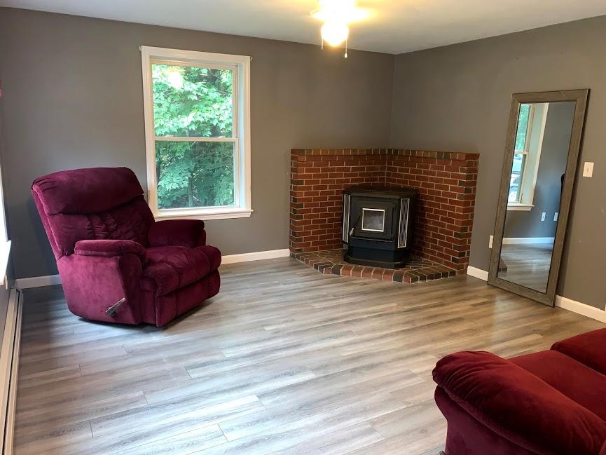 7 Ridgeway Circle North Waterboro, ME 04061 - Photo 5 of 20 Living Room, Pellet Stove