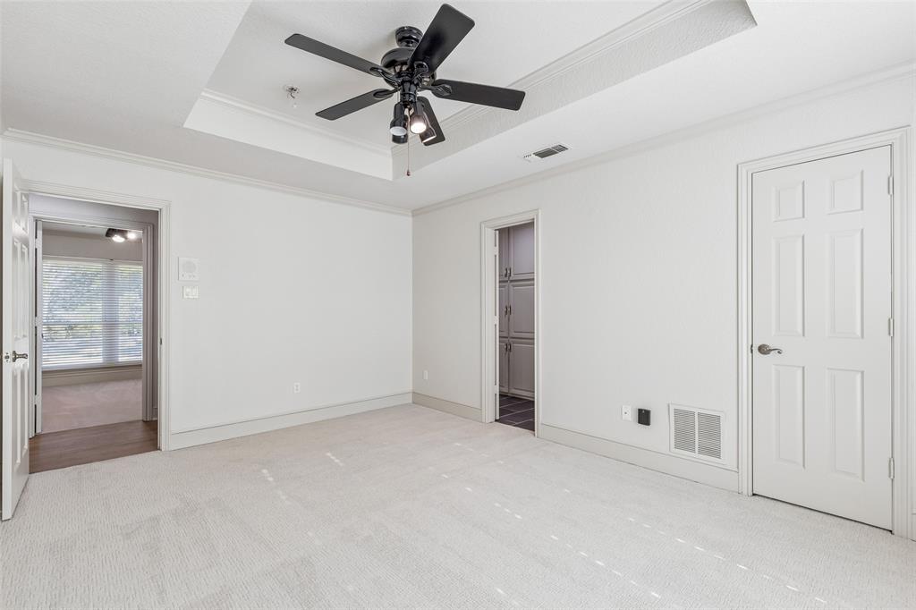 1155 Point Vista Road Hickory Creek, TX 75065 - Photo 17 of 40 Recessed ceiling with a black ceiling fan