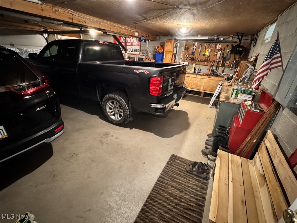 58410 Wharton Road Barnesville, OH 43713 - Photo 24 of 36 Garage with a workshop area
