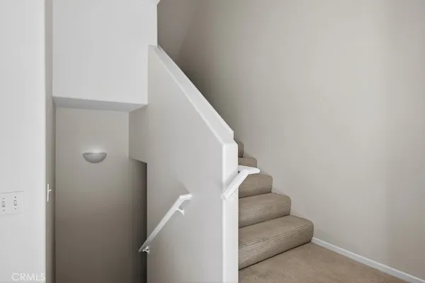 a view of a pathway with a house