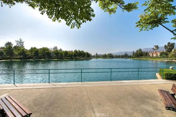 a view of lake with green space