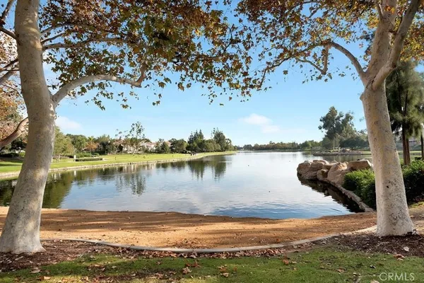 a view of a lake with a house