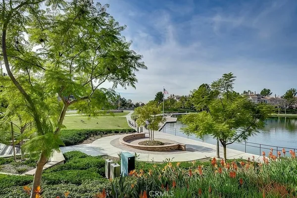 an aerial view of a house with a lake view