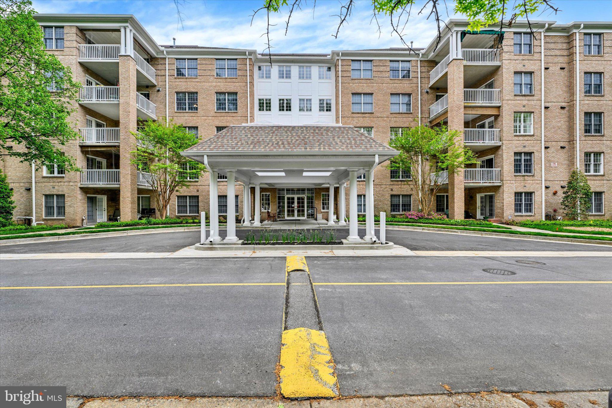 12310 Rosslare Ridge Road, Unit 405 Lutherville-Timonium, MD 21093 - Photo 2 of 30 Charming residential complex entrance.