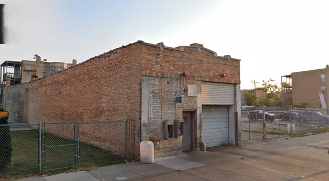 a view of a street with cars
